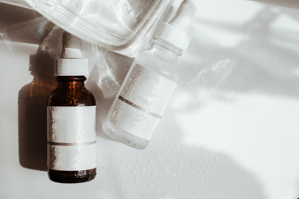 Cosmetic Bottles with Moist Flatlay