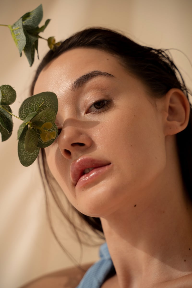 Woman with Plant Leaves on Her Eye